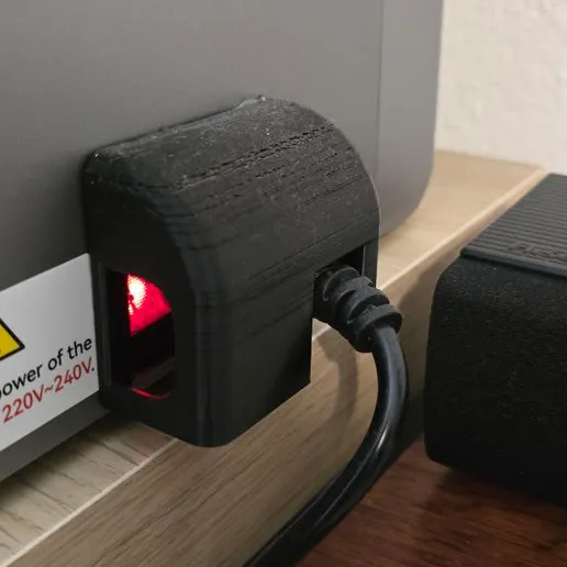 QIDI Plus 4 resin splash shield installed on the power switch